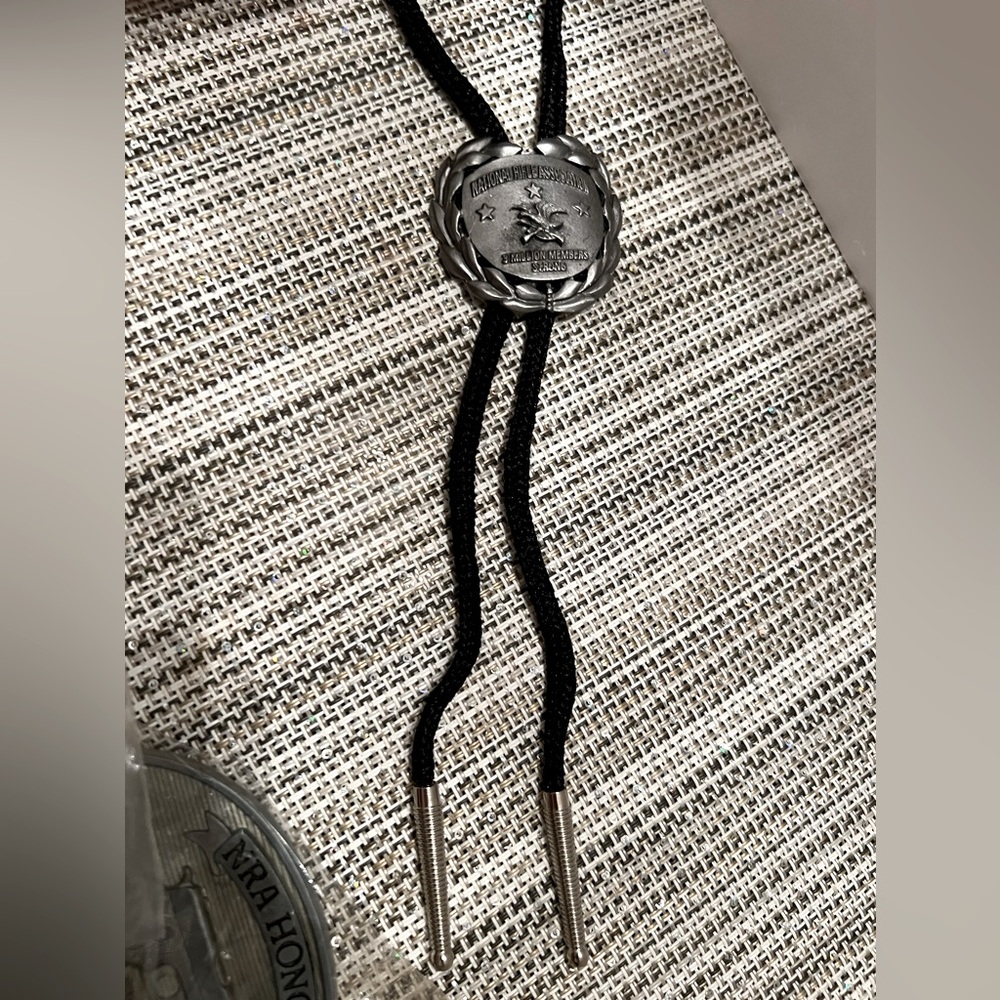 Vintage NRA National Rifle Association Bolo Tie. Pewter w/black tie. New.